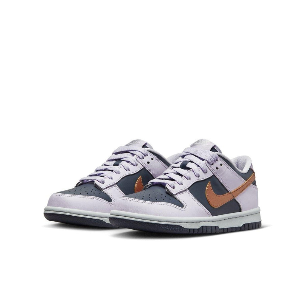 Nike Dunk Low SE Copper Swoosh GS sneakers in light purple and navy, featuring a copper Nike Swoosh and a sleek design.