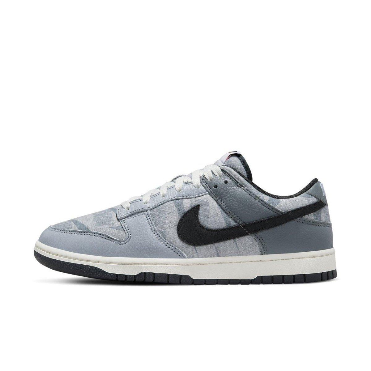 Nike Dunk Low SE Copy Paste in gray and black, stylish sneaker with a unique design, perfect for casual wear.
