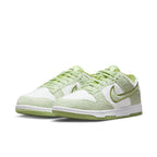 Nike Dunk Low SE Fleece Pack Honeydew Women's sneakers in soft green and white with textured fabric and embroidered Swoosh.