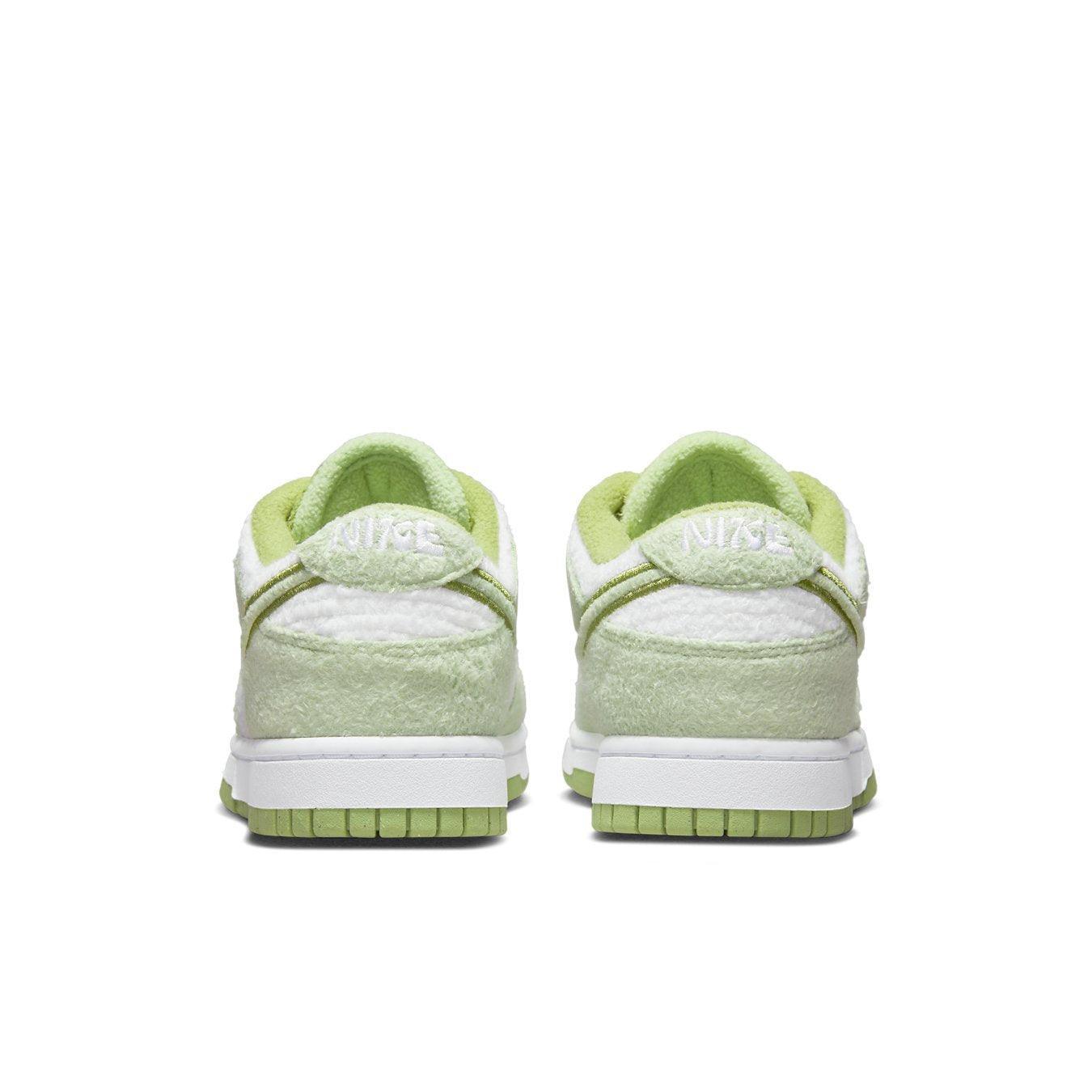 Back view of Nike Dunk Low SE Fleece Pack Honeydew sneakers featuring soft fleece textures and green accents.