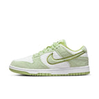 Nike Dunk Low SE Fleece Pack Honeydew for women, featuring white and green fleece material with a contrasting Swoosh.
