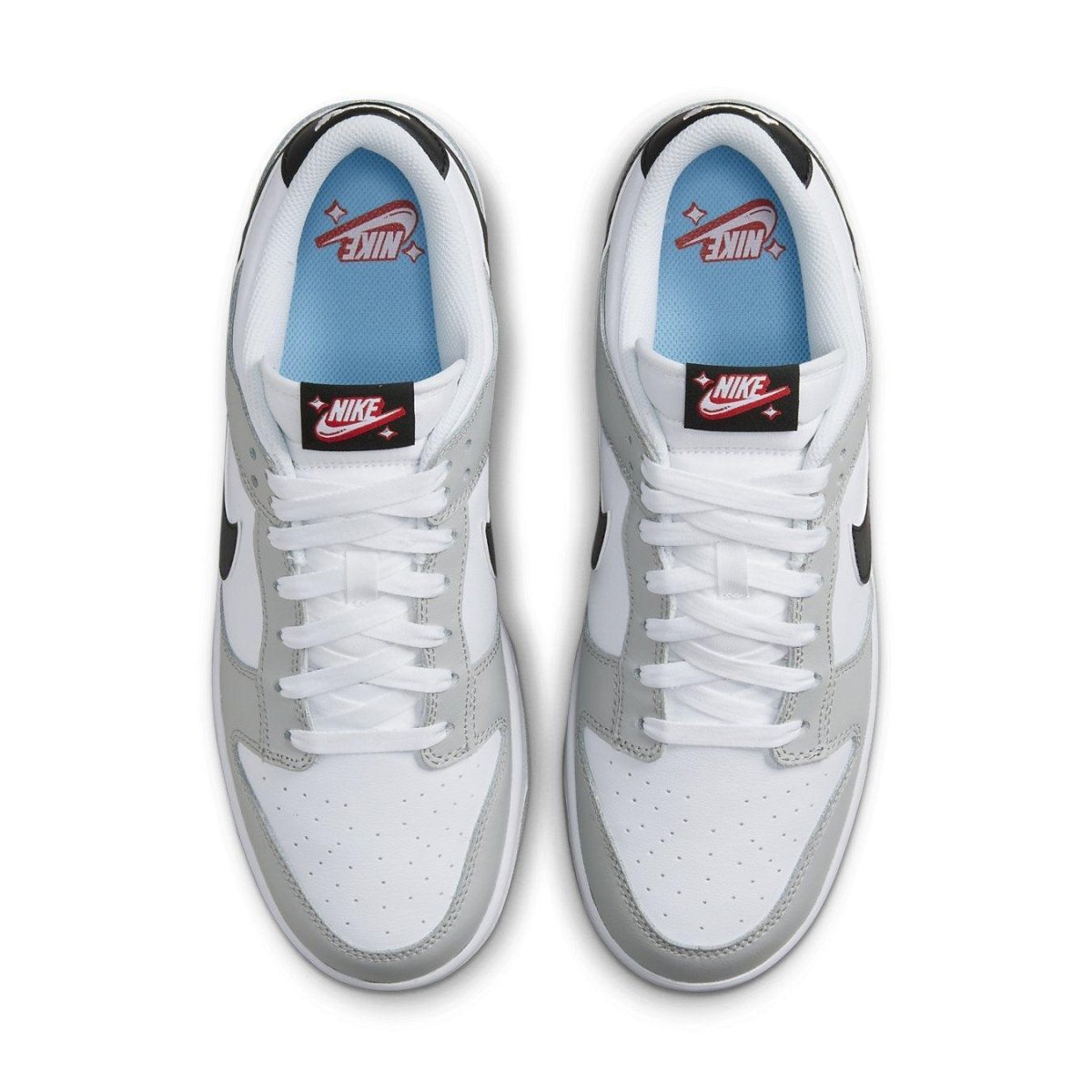 Nike Dunk Low SE Lottery Pack in Grey Fog with white leather and black Swoosh, showcasing top view.