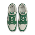 Nike Dunk Low SE Lottery Pack Malachite Green sneakers, featuring ivory leather and kelly green overlays, top view.