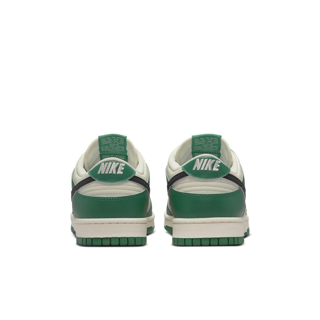 Nike Dunk Low SE Lottery Pack Malachite Green sneakers, rear view showcasing ivory and green colorway.