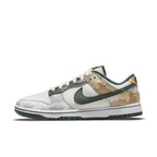 Nike Dunk Low SE Sail Multi-Camo sneaker featuring canvas upper and camo panels.