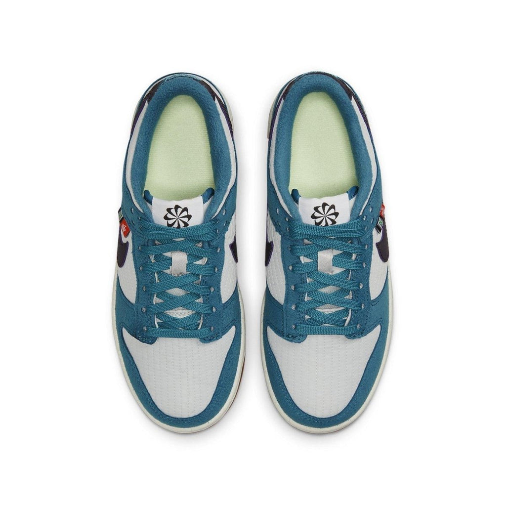 Nike Dunk Low SE Toasty Rift Blue sneakers, featuring quilted upper and suede, top view.