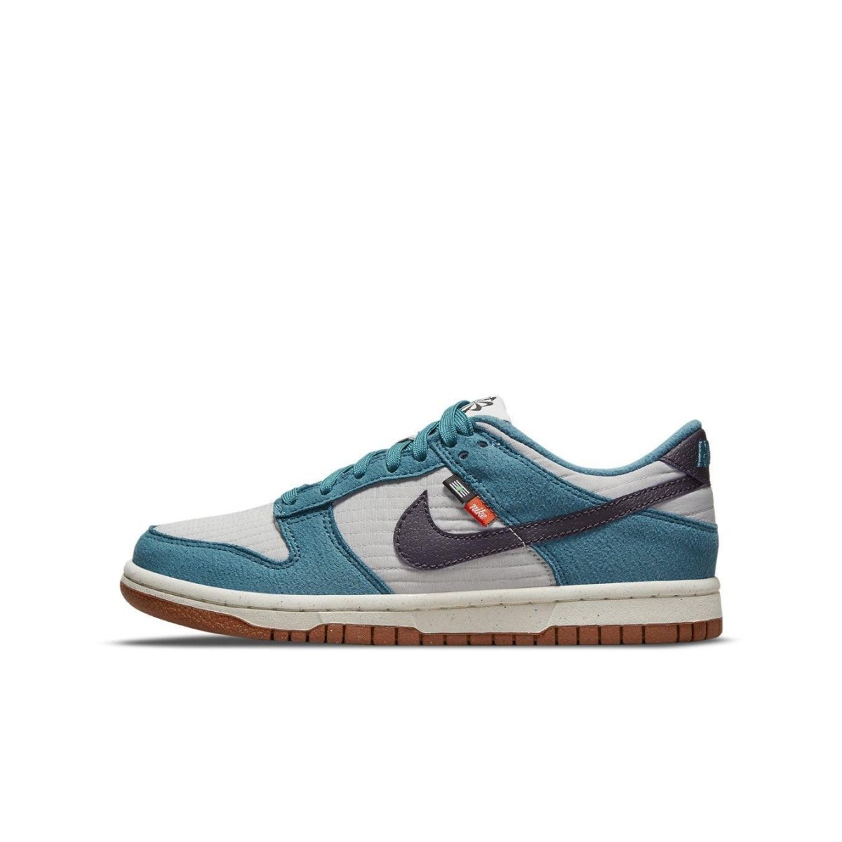 Nike Dunk Low SE Toasty Rift Blue shoes featuring quilted fabric and suede upper for style and comfort.