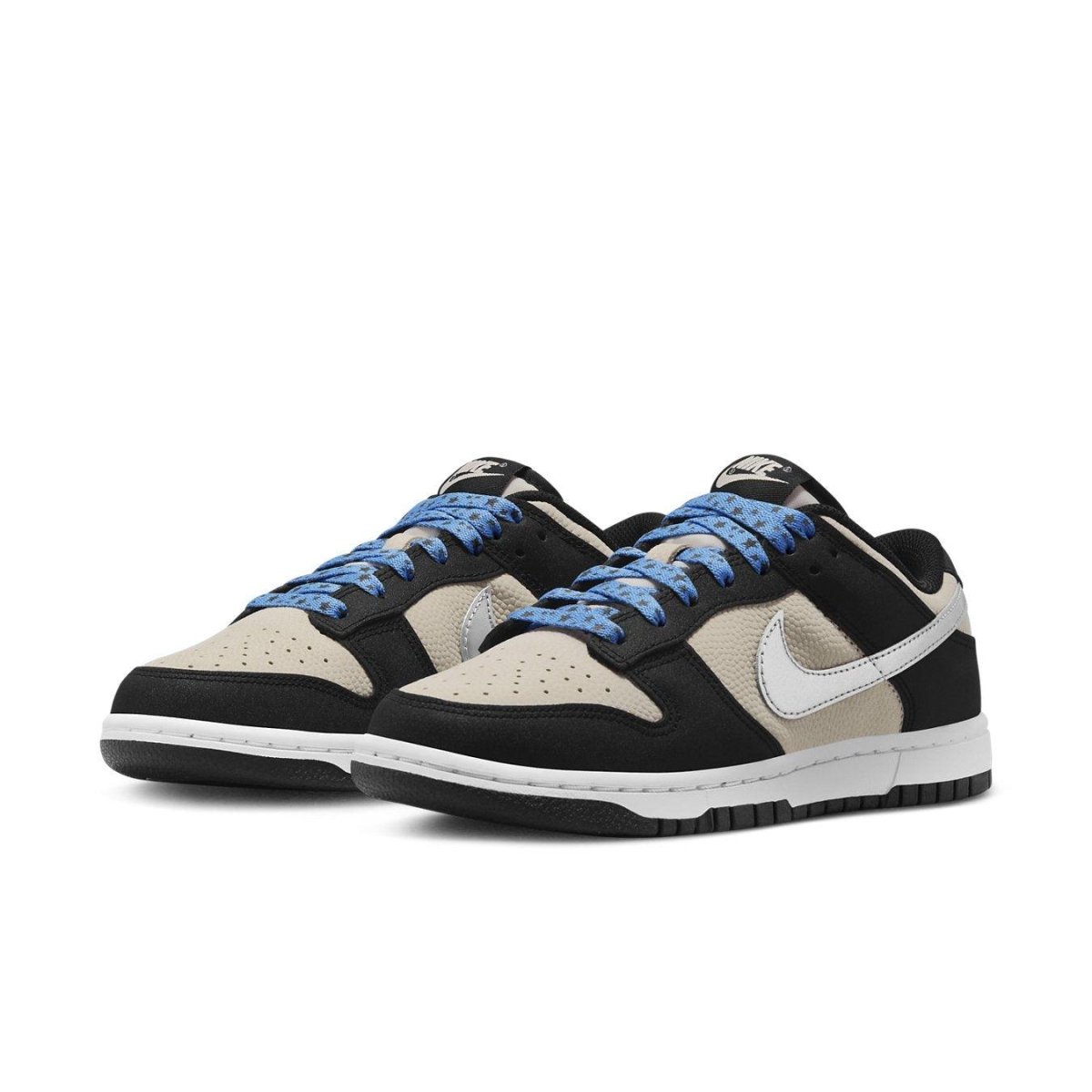 Nike Dunk Low Starry Laces (W) with Light Bone, black, and metallic silver accents, showcasing blue laces.