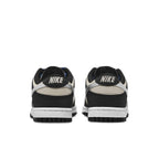 Nike Dunk Low Starry Laces W rear view showcasing sleek black and cream design with metallic Swoosh.