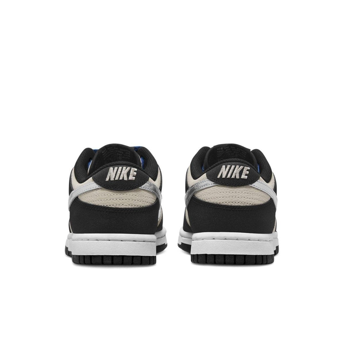 Nike Dunk Low Starry Laces W rear view showcasing sleek black and cream design with metallic Swoosh.