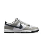 Nike Dunk Low Stencil Swoosh in grey and white with double Swoosh design and smooth leather upper.