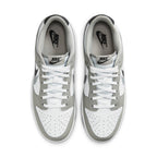 Nike Dunk Low Stencil Swoosh Grey White sneakers with sleek leather upper and double Swoosh design.