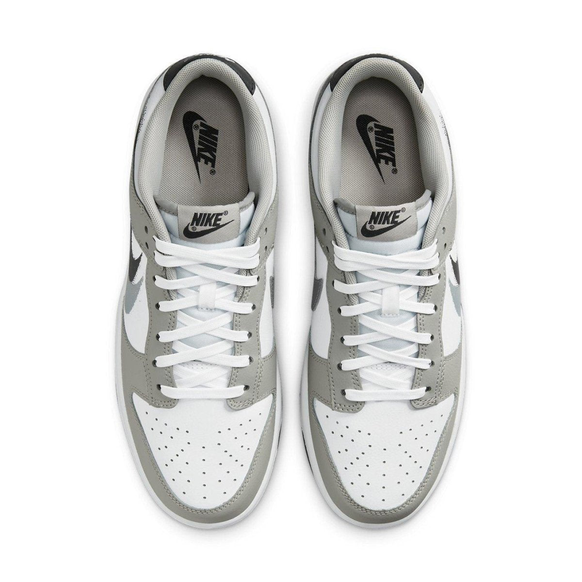 Nike Dunk Low Stencil Swoosh Grey White sneakers with sleek leather upper and double Swoosh design.