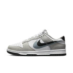 Nike Dunk Low Stencil Swoosh in grey and white with double Swoosh design, perfect for casual chic styling.