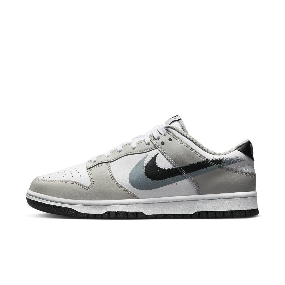 Nike Dunk Low Stencil Swoosh in grey and white with double Swoosh design, perfect for casual chic styling.