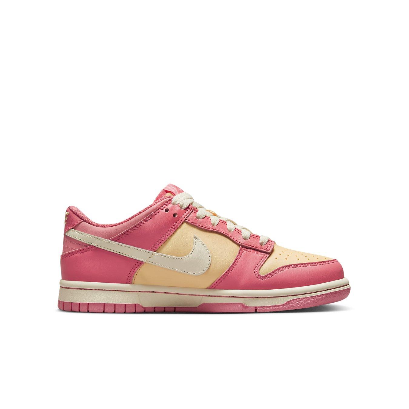 Nike Dunk Low Strawberry Peach Cream sneakers in pink and peach tones, perfect for summer walks.