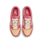 Nike Dunk Low Strawberry Peach Cream (GS) sneakers in pink and peach hues, featuring a white Swoosh and laces.