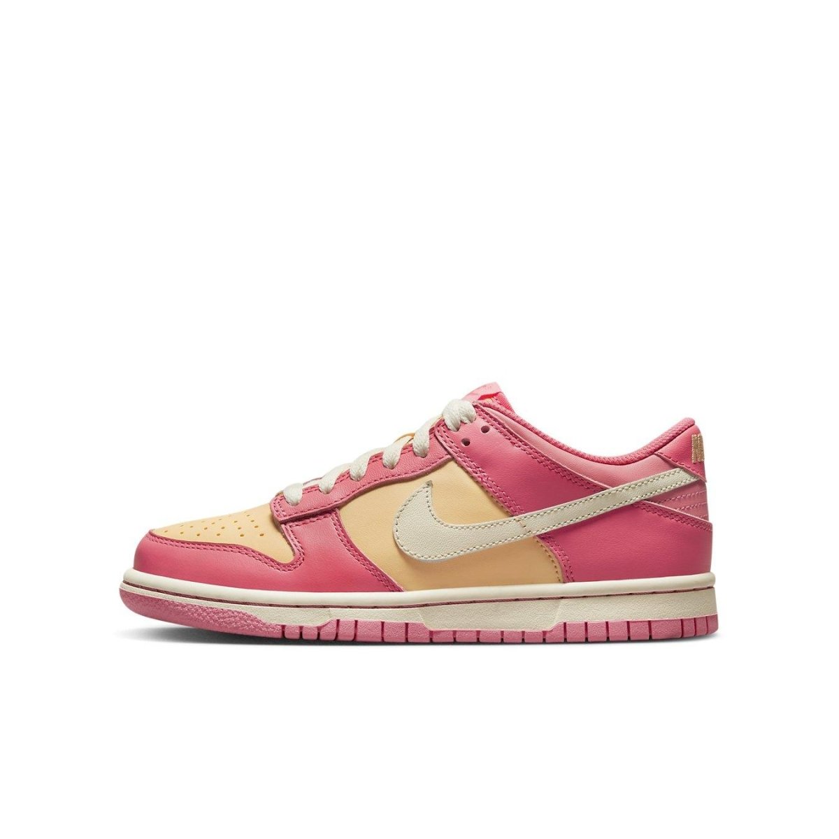 Nike Dunk Low Strawberry Peach Cream sneakers in pink and peach colorway, perfect for summer strolls.