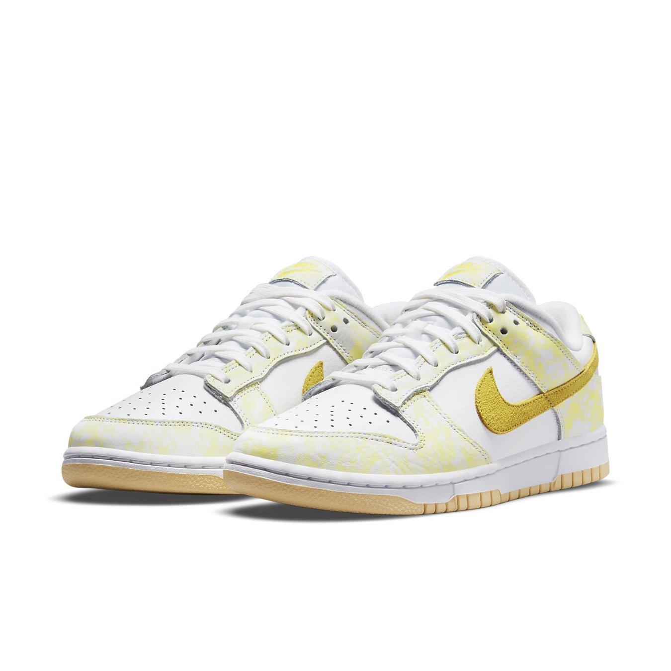 Nike Dunk Low Strike Yellow (W) featuring white leather and mustard suede accents for a bright sporty look.