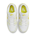 Nike Dunk Low Yellow Strike women's shoes, featuring white leather with yellow accents and comfortable fit.