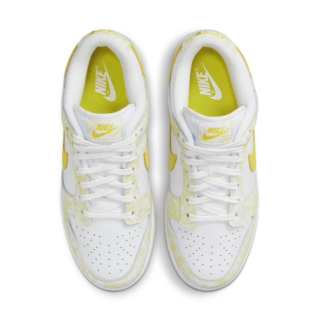 Nike Dunk Low Yellow Strike women's shoes, featuring white leather with yellow accents and comfortable fit.