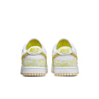 Nike Dunk Low Strike Yellow (W) women's sneakers, featuring white leather and vibrant yellow accents.