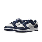 Nike Dunk Low Summit White Midnight Navy sneakers featuring leather design and perforated toe.