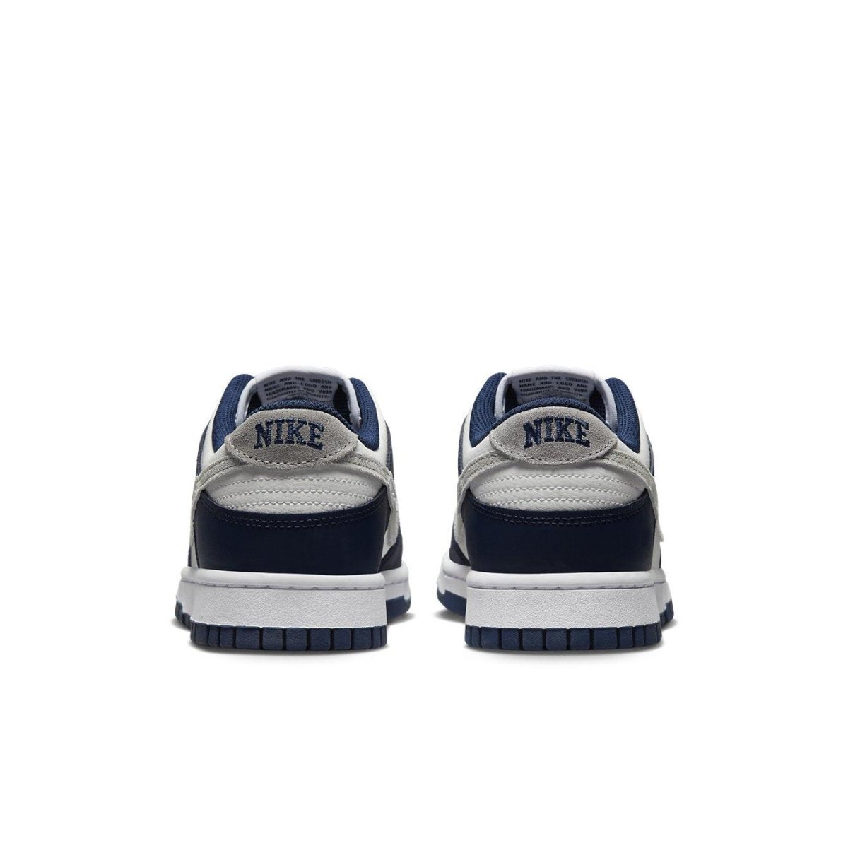 Nike Dunk Low Summit White Midnight Navy shoes from the back, showcasing high-quality leather and classic Nike branding.