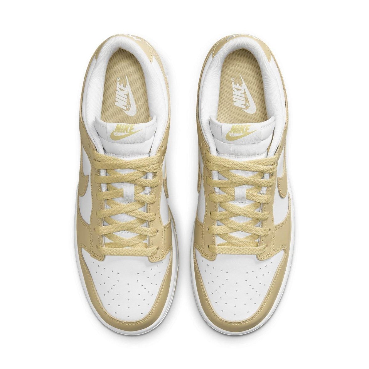 Nike Dunk Low Team Gold sneakers featuring white leather and soft yellow overlays.