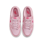 Nike Dunk Low Triple Pink GS sneaker with light and dark pink shades, featuring bold Hyper Pink Swooshes.