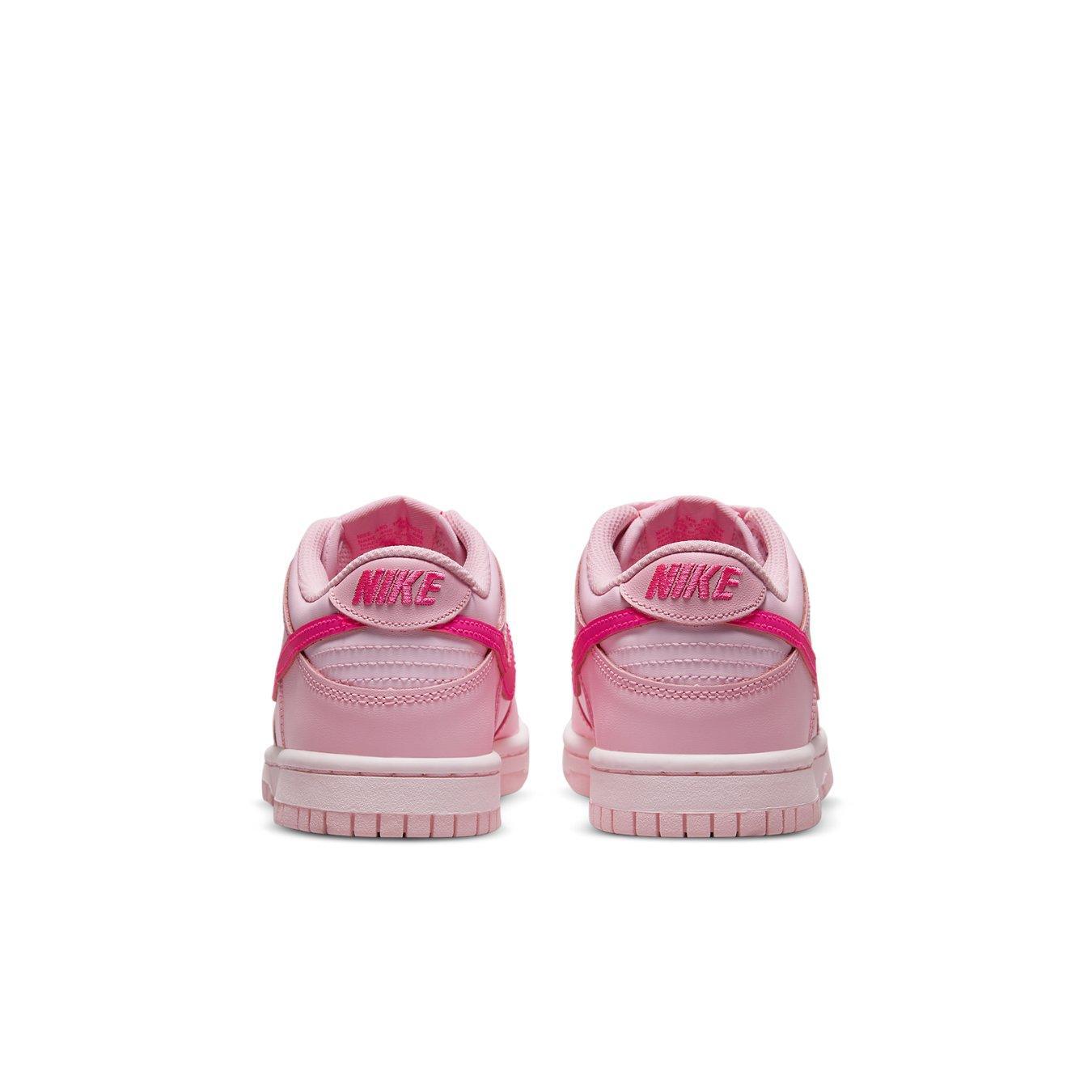 Nike Dunk Low Triple Pink GS back view showcasing leather and vibrant pink colorway.