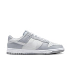 Nike Dunk Low Two Tone Grey sneakers in white leather with grey overlays and white Swoosh, showcasing modern style.