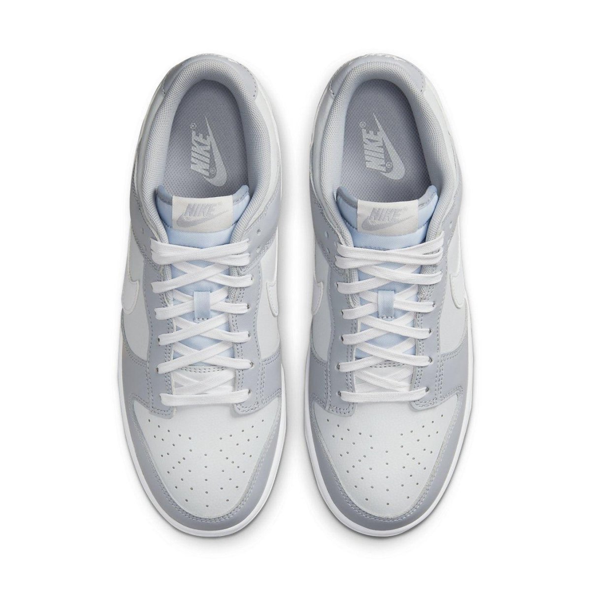 Nike Dunk Low Two Tone Grey, white leather with grey overlays, featuring a sleek design and iconic Swoosh.