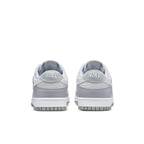 Nike Dunk Low Two Tone Grey sneakers, featuring white leather with grey overlays and Nike branding on the heel.