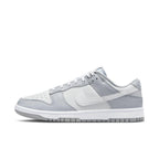 Nike Dunk Low Two Tone Grey sneaker featuring white leather with grey overlays and classic Swoosh design.