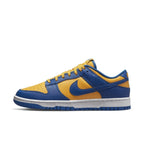 Nike Dunk Low UCLA in blue and yellow leather, featuring Swoosh logo and classic two-tone design.
