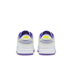 Nike Dunk Low Union 'Court Purple' sneakers, featuring a purple and white colorway at the heel.