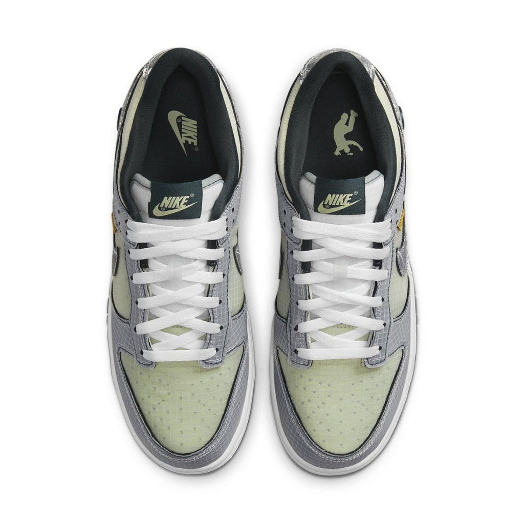 Nike Dunk Low Union Passport Pack Pistachio sneakers from above with white laces and a green accent.