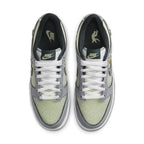 Nike Dunk Low Union Passport Pack Pistachio sneakers from above with white laces and a green accent.