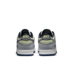 Nike Dunk Low Union Passport Pack Pistachio sneaker back view, featuring grey and pistachio color scheme with Nike branding.