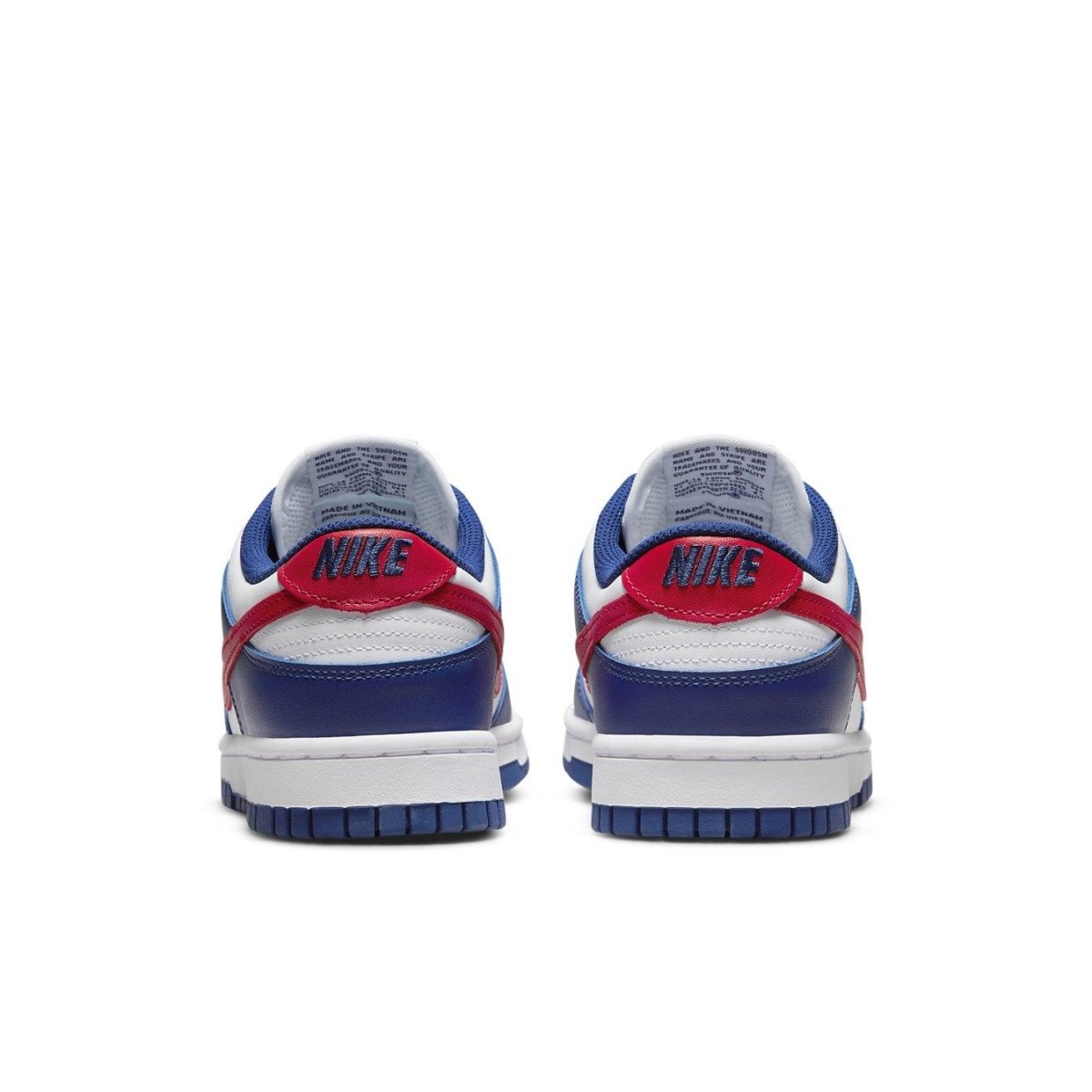 Nike Dunk Low USA Womens sneakers, featuring bold red, white, and blue design and Air cushioning.