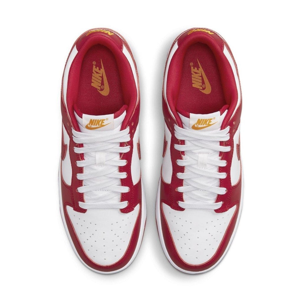 Nike Dunk Low USC sneakers in red and white, celebrating UCLA Bruins and USC Trojans rivalry.