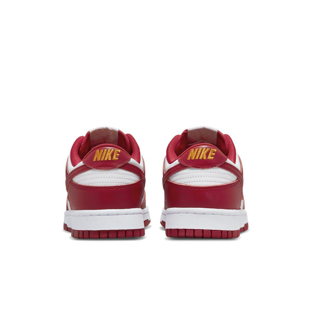 Nike Dunk Low USC sneaker rear view featuring red and white design with gold Nike logo.
