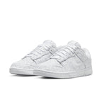 Nike Dunk Low White Paisley Women's sneakers with white canvas and light grey paisley pattern.
