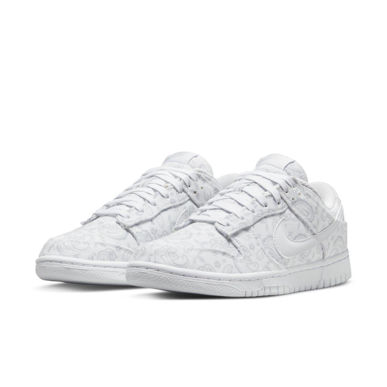 Nike Dunk Low White Paisley Women's sneakers with white canvas and light grey paisley pattern.