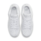 Nike Dunk Low White Paisley (W) sneaker featuring a white fabric upper with light gray paisley patterns.