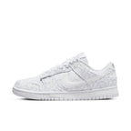 Nike Dunk Low White Paisley sneakers featuring white canvas upper and light gray paisley pattern.