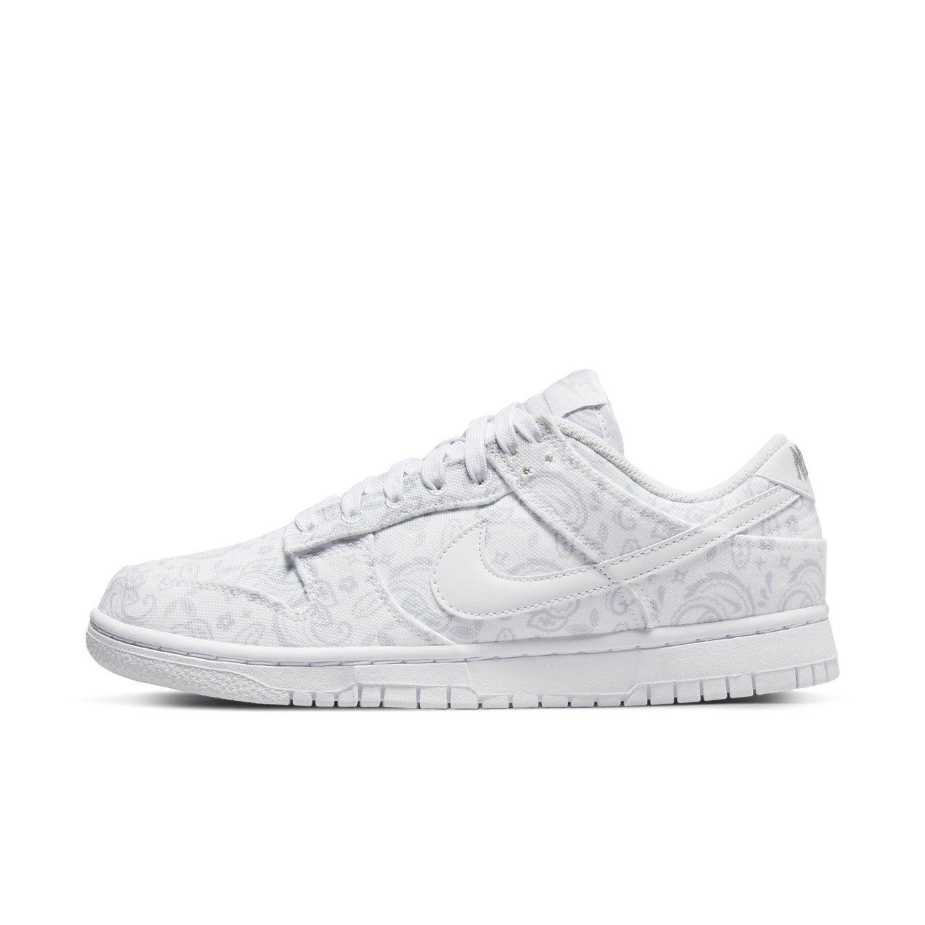 Nike Dunk Low White Paisley sneakers featuring white canvas upper and light gray paisley pattern.