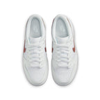 Nike Dunk Low White Pink (GS) sneakers with a white leather upper and bronze Swoosh detail from above.