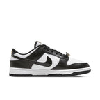 Nike Dunk Low World Champs in black and white with gold accent details, featuring a luxurious design.